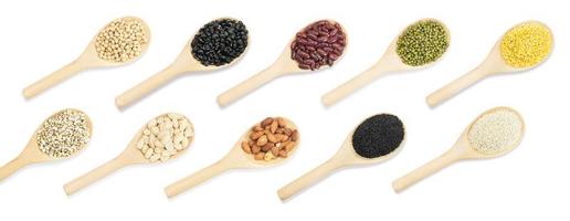 Collection set of beans and sesame on wooden spoons isolated on white background,top view photo