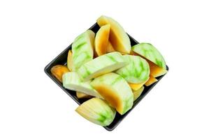 Mango,Ripe mangoes ready to eat on black dish isolated on white photo
