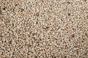 raw  and roasted coffee beans,green unroasted coffee beans,for background photo