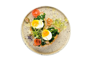 White plate with toast, vegetables and boiled eggs isolated on a transparent background png