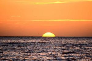 Sunset over the sea photo