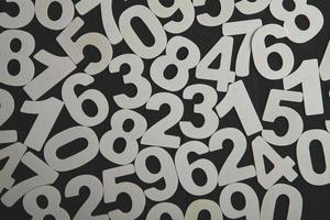 Background of numbers. from zero to nine. Finance data concept. Mathematic. Seamless pattern with numbers. financial crisis concept. Business success. photo