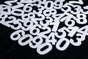 Background of numbers. from zero to nine. Finance data concept. Mathematic. Seamless pattern with numbers. financial crisis concept. Business success. photo