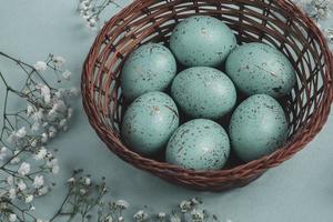 Pastel Easter eggs background. Spring greating card. Easter eggs in basket photo