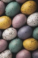 Pastel Easter eggs background. Spring greating card. Easter eggs in basket photo