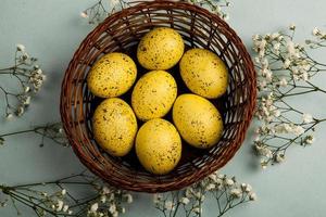 Pastel Easter eggs background. Spring greating card. Easter eggs in basket photo