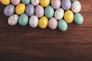 Pastel Easter eggs background. Spring greating card. Easter eggs in basket photo