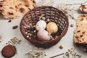 Pastel Easter eggs background. Spring greating card. Easter eggs in basket photo