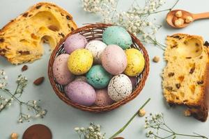 Pastel Easter eggs background. Spring greating card. Easter eggs in basket photo