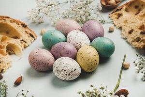 Pastel Easter eggs background. Spring greating card. Easter eggs in basket photo