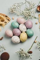 Pastel Easter eggs background. Spring greating card. Easter eggs in basket photo