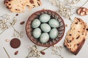 Pastel Easter eggs background. Spring greating card. Easter eggs in basket photo