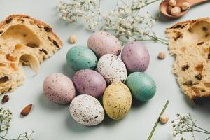 Pastel Easter eggs background. Spring greating card. Easter eggs in basket photo