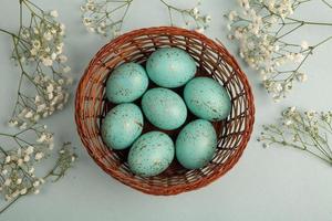 Pastel Easter eggs background. Spring greating card. Easter eggs in basket photo