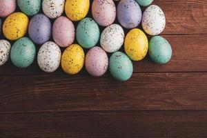 Pastel Easter eggs background. Spring greating card. Easter eggs in basket photo