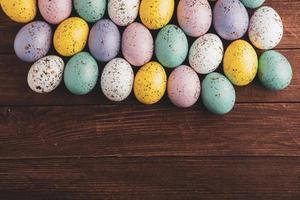 Pastel Easter eggs background. Spring greating card. Easter eggs in basket photo