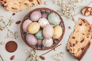 Pastel Easter eggs background. Spring greating card. Easter eggs in basket photo