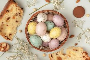 Pastel Easter eggs background. Spring greating card. Easter eggs in basket photo