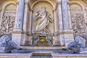 Rome, Italy - June 11  2017 Rome, Italy, Fountain of Moses -happy water fountain. Moses is depicted as indicating the water spring from the rock. photo