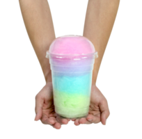 hand holding cotton candy in plastic cup isolated png