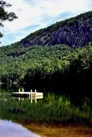 Diving dock in mountain lake western North Carolina photo