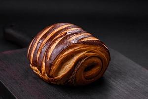 Delicious sweet crispy fresh baked cinnamon bun photo