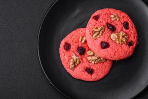 Delicious fresh crunchy pink oatmeal cookies with raspberry flavor photo