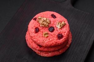 Delicious fresh crunchy pink oatmeal cookies with raspberry flavor photo