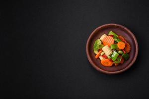 Delicious healthy vegetables steamed carrots, broccoli, asparagus beans photo