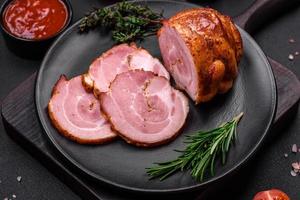 Delicious fresh baked meat roll with spices and herbs photo