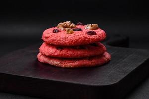 Delicious fresh crunchy pink oatmeal cookies with raspberry flavor photo