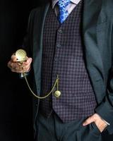 Portrait of Gentleman in Suit Holding Pocket Watch. Vintage Style and Retro Fashion.