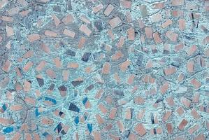 abstract texture of concrete wall with random mosaic pattern photo