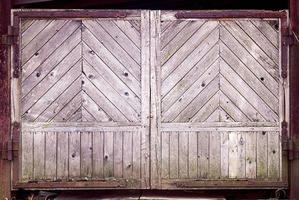 old wooden gate closed, rustic wood texture background photo