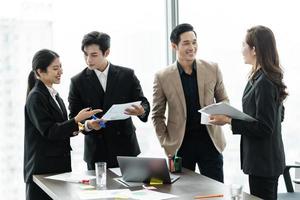 image of a group of Asian businessmen working together at the company photo