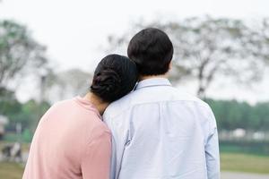 Elderly Asian couple in the park photo