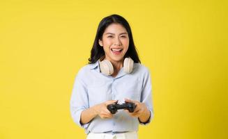 Asian woman on yellow background photo