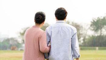 Elderly Asian couple in the park photo