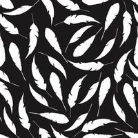 Seamless pattern with feathers on a black vector