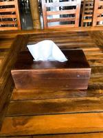 Wooden tissue box on the table photo