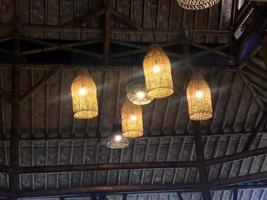 Decorating lantern lamps. Decorating hanging lantern lamps in wooden from bamboo.Lamps ,Lamps with bamboo, handmade in Indonesia. islamic background photo