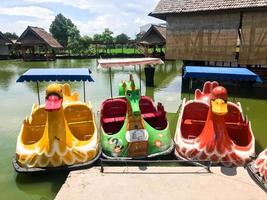 An empty duck-shaped water bike photo