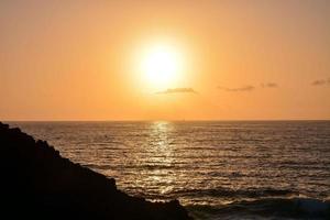 Sunset over the sea photo