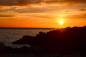 Sunset over the sea photo