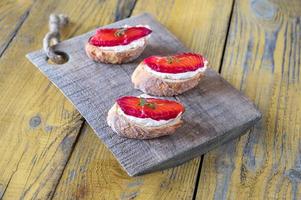 Sandwiches with cream cheese and cured salmon photo