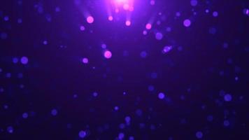 Abstract background of purple luminous particles and bokeh dots of festive energy magic, video 4k, 60 fps