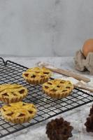 Small apple pie served on a cake rack, tastes sweet and savory. Food concept photo. photo