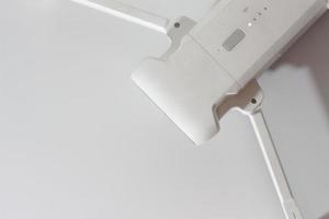 a close up of detailed white drone parts photo