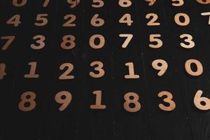 Background of numbers. from zero to nine. Finance data concept. Mathematic. Seamless pattern with numbers. financial crisis concept. Business success. photo