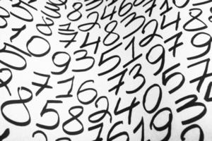 Background of numbers. from zero to nine. Finance data concept. Mathematic. Seamless pattern with numbers. financial crisis concept. Business success. photo